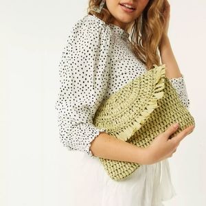 straw clutch bag in pistachio